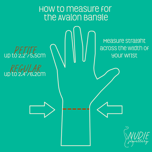 Wrist measuring guide – illustration of a hand with arrows showing how to measure straight across the wrist. Petite fits up to 2.2", regular fits up to 2.4".