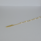 Maris Bracelet by Nudie – studio photo on white background showing the end of the chain with brushed gold hoops and delicate 18k gold-plated finish.